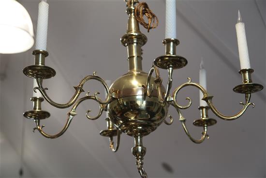 A pair of 17th century style Dutch design six branch ball and column ceiling chandeliers
